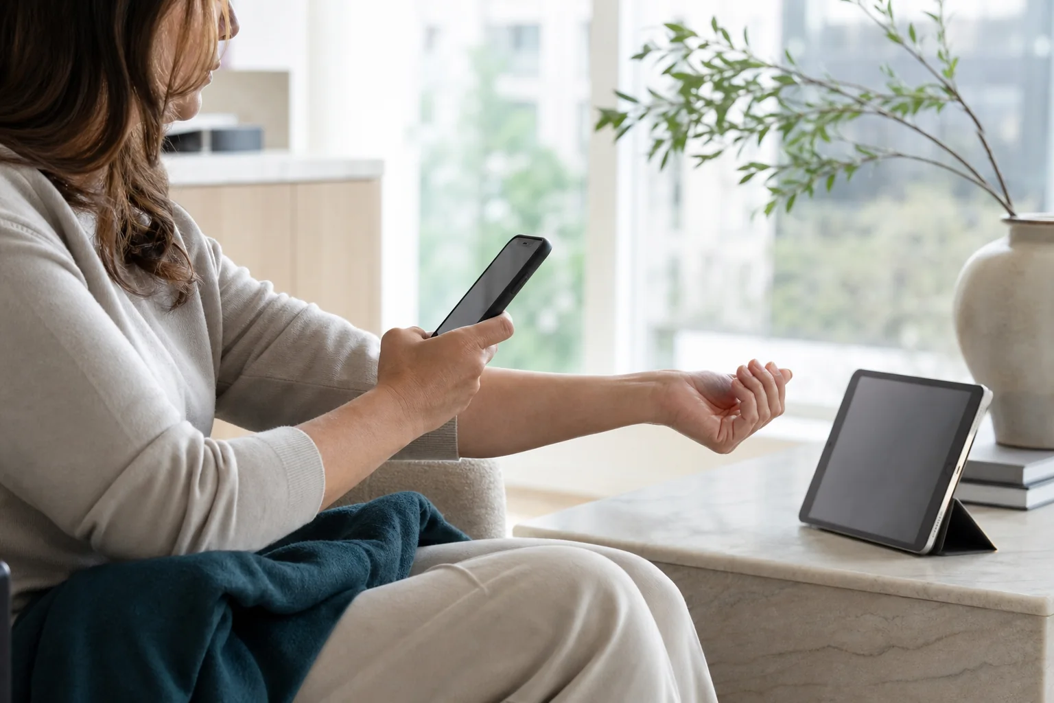 A patient taking a private recovery check-in photo at home